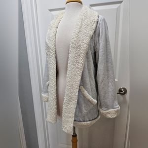 The Vermont Country Store size Large fluffy stretchy tee material jacket.